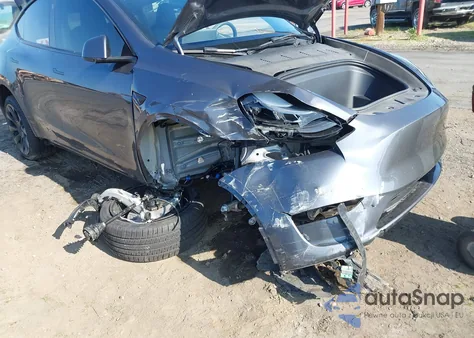 2023 Tesla Model Y Awd/Long Range Dual Motor All-Wheel Drive z USA, uszkodzony, nr VIN 7SAYGDEE2PF896326